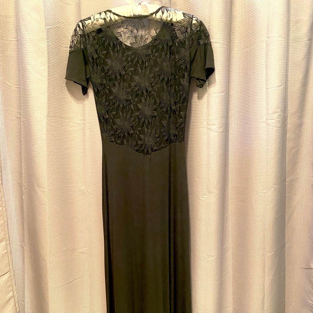 Elegant floor length black dress with lace back.